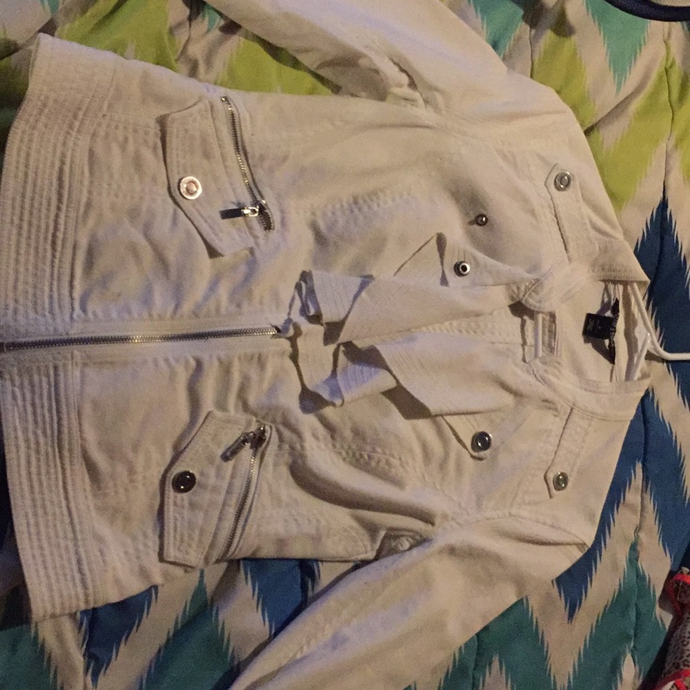 White jean jacket with silver buttons